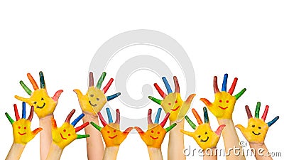 Group of happy children raises hands up. Stock Photo