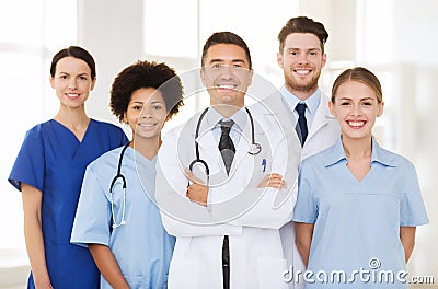 Group of happy doctors at hospital Stock Photo