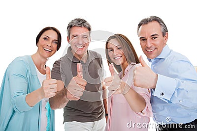 Group of happy people showing thumb up sign Stock Photo