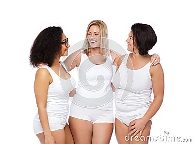 Group of happy plus size women in white underwear Stock Photo