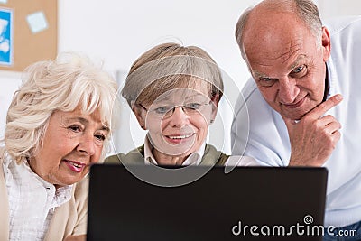 Group of happy retired people Stock Photo