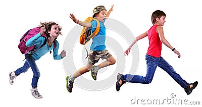 Group of happy school children or travelers running together Stock Photo