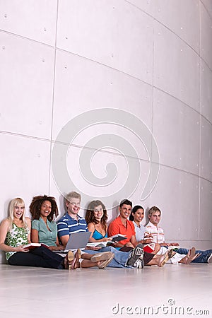 Group of happy students studying Stock Photo