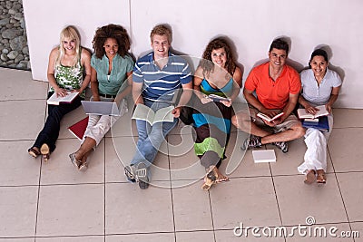 Group of happy students studying Stock Photo