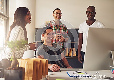 Group of happy young adults at small business Stock Photo