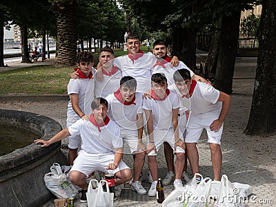 Group of happy young Basque boys in traditional dress white dress and red scarf Editorial Stock Photo