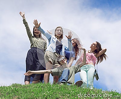 Group of happy young college students having fun Stock Photo