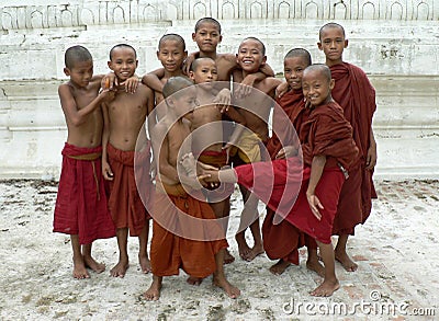 Group of happy young novice monks having fun, Myanmar Editorial Stock Photo