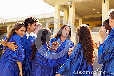 Group Of High School Students Celebrating Graduation Stock Photo