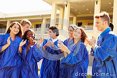 Group Of High School Students Celebrating Graduation Stock Photo