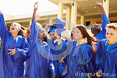 Group Of High School Students Celebrating Graduation Stock Photo