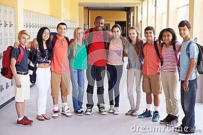 Group Of High School Students Standing In Corridor Stock Photo