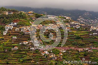 Group of houses on terraced terrain in Madeira, Portugal Stock Photo