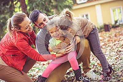 Group hug to all family. Stock Photo