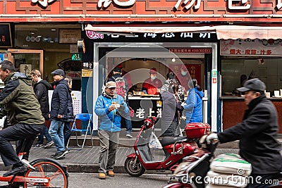 People queue to buy takeaway food, Shanghai China Editorial Stock Photo