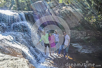 Group of Indian friends having fun in Waterfall in Royal Natal National Park South Africa Editorial Stock Photo