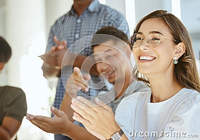 Group of joyful diverse businesspeople clapping hands in support during a meeting together at work. Happy hispanic Stock Photo