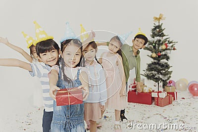 Group of kids celebrate Christmas and happy new year party Stock Photo