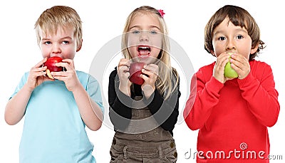 Group of kids children eating apple fruit autumn fall healthy is Stock Photo