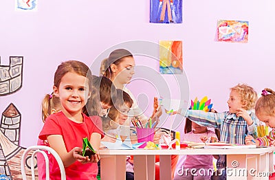 Group of kids in origami preschool class Stock Photo