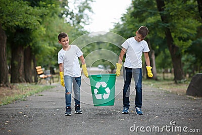 Group of kids volunteer help garbage collection charity environment, selective soft focus. Team work. Stock Photo