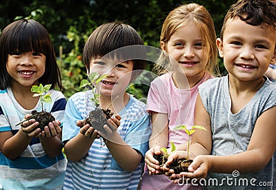 Group of kindergarten kids friends gardening agriculture Stock Photo