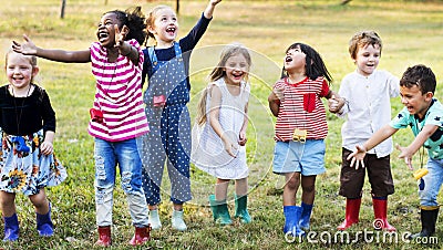 Group of kindergarten kids learning gardening outdoors field trips Stock Photo