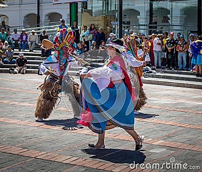 Group in local costume performing ecuadorian traditional dance - Quito, Ecuador Editorial Stock Photo