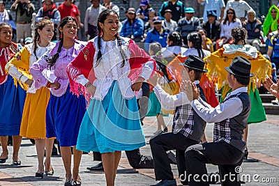 Group in local costume performing ecuadorian traditional dance - Quito, Ecuador Editorial Stock Photo