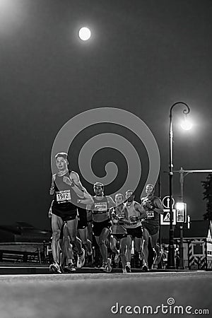 group male athlete running Marathon White Nights Editorial Stock Photo