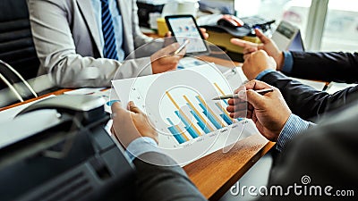 Group of male entrepreneurs discussing management project during working together and analyzing accounting trade and experience in Stock Photo