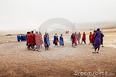 Group Masai or Maasai tribe peoples in red and blue cloth dancing. Ethnic group of Ngorongoro Consevation, Serengeti in Tanzania Editorial Stock Photo