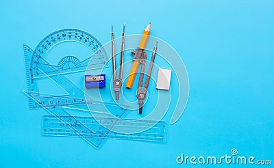 Group of mathematics geometry tools on blue background Stock Photo
