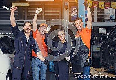 Group of mechanics, Professional Mechanic in the garage. Auto repair garage Stock Photo