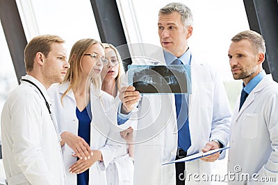 Group of medics with x-ray scan Stock Photo