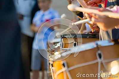 Group of Men Dressed in Medieval Clothes Playing Drums Stock Photo