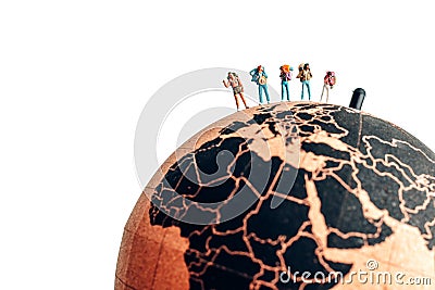 Group of miniature backpacking hikers. Travel concept Stock Photo