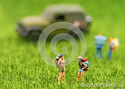 Group Miniature traveler and hiker backpack standing in the forest for the tourist and adventure Stock Photo