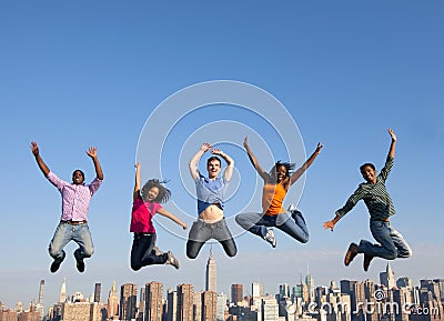 Group of Multi Racial People Jumping in the City Stock Photo