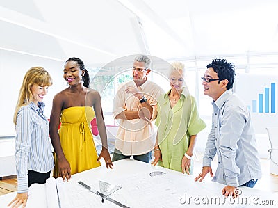 Group of Multiethnic Designers Having a Meeting Stock Photo