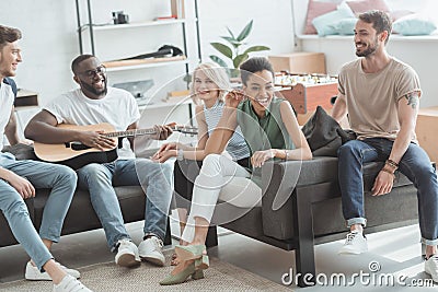 group of multiethnic smiling young people having fun and playing Stock Photo