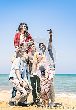 Group of multiracial happy friends taking a selfie Stock Photo