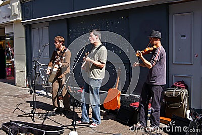 Performers busking on the streets of Galway, Ireland Editorial Stock Photo