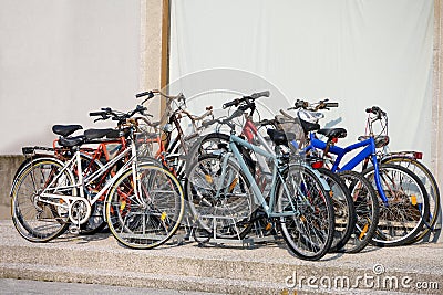 group cycles bicycles old rotten concept bike colorful Stock Photo