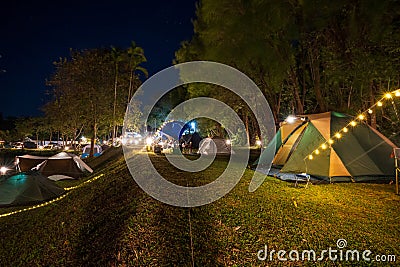 camping tent in the forest under night sky, Tourism concept Stock Photo