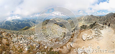 Group people ascending mountain panorama. Editorial Stock Photo