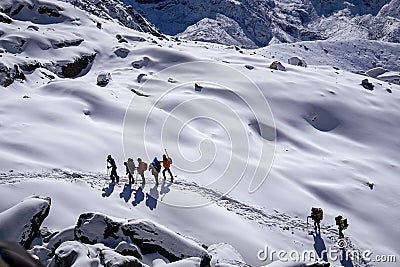 Group of people with backpack trekking to the chola pass (EBC, Everest, Nepal, Himalaya) Editorial Stock Photo