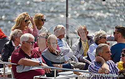 A group of people on a boat trip through the port of Hamburg Editorial Stock Photo