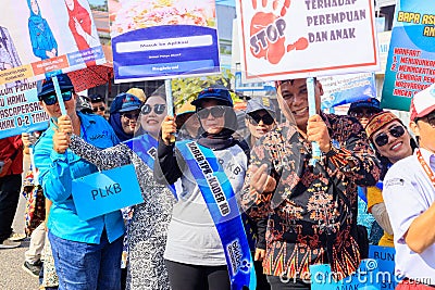 a group of people carrying banners Editorial Stock Photo