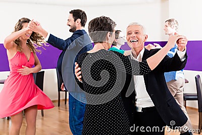 Group of people dancing in dance class Stock Photo